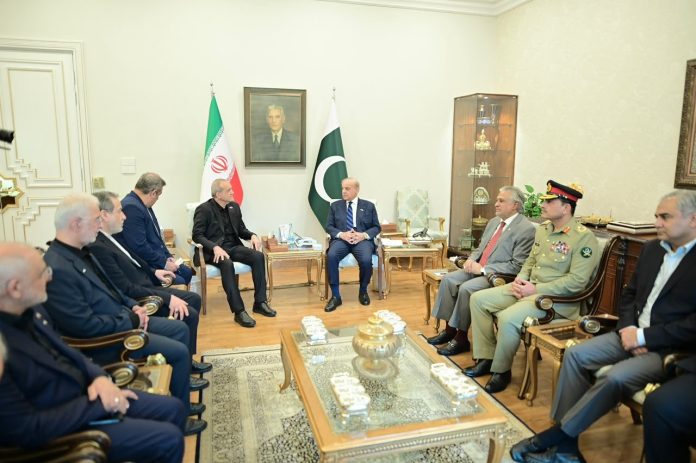 Iranian and Pakistani diplomatic officials during tense mediation talks.